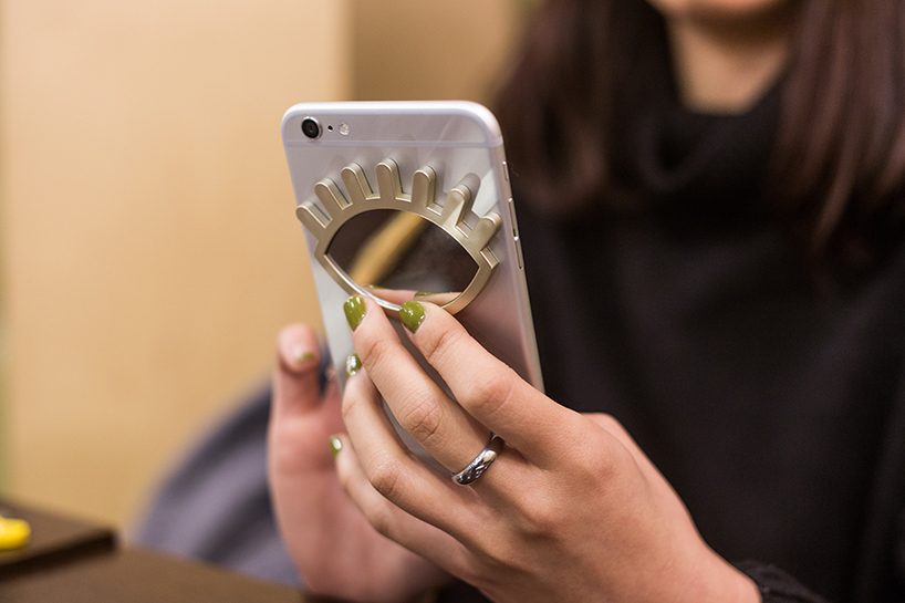 refix coin mirror is a playful adhesive accessory for personal items