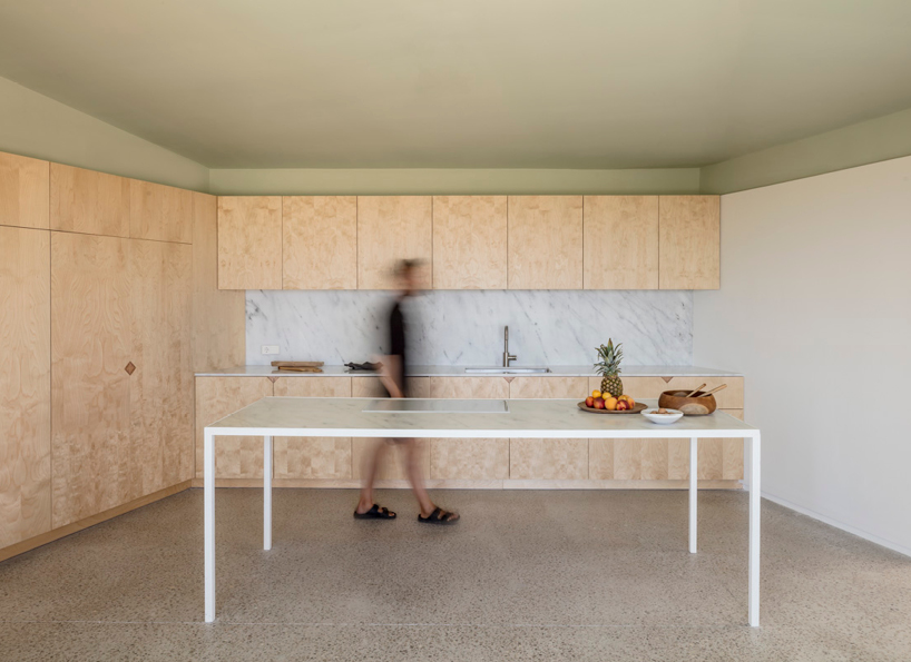 nomo studio lifts white polyhedral volumes above spanish landscape