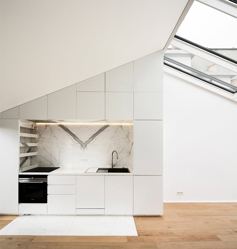 vincent parreira converts 19th century photography studio into parisian apartments