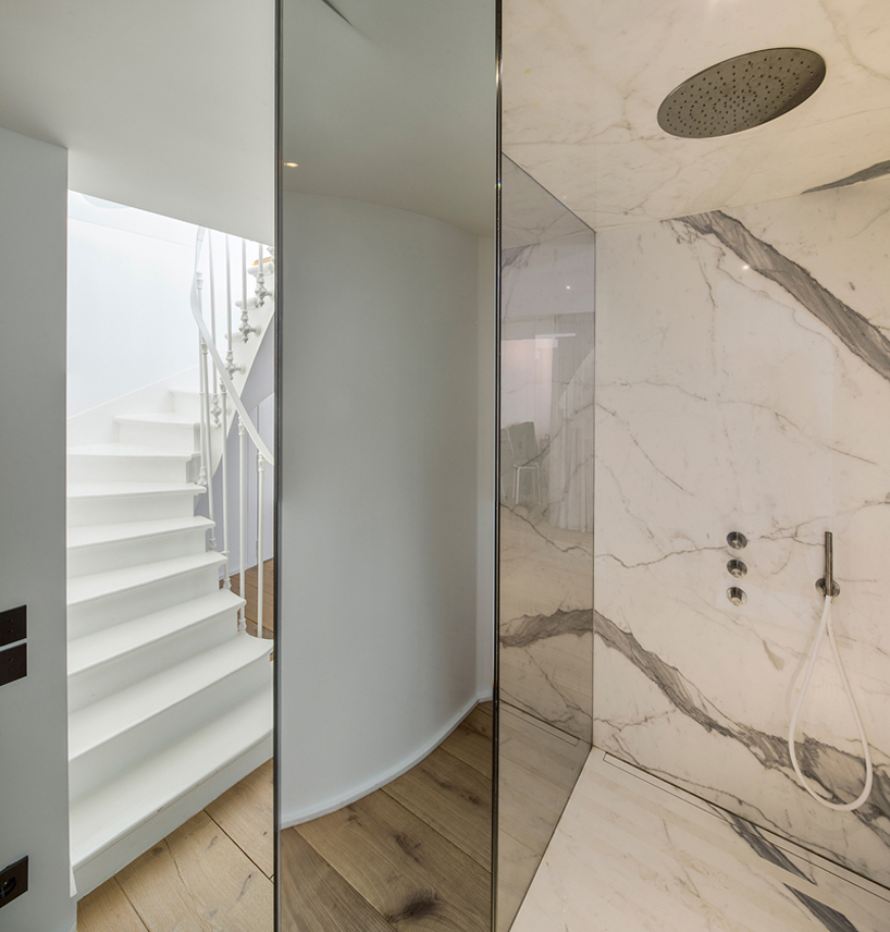 vincent parreira converts 19th century photography studio into parisian apartments