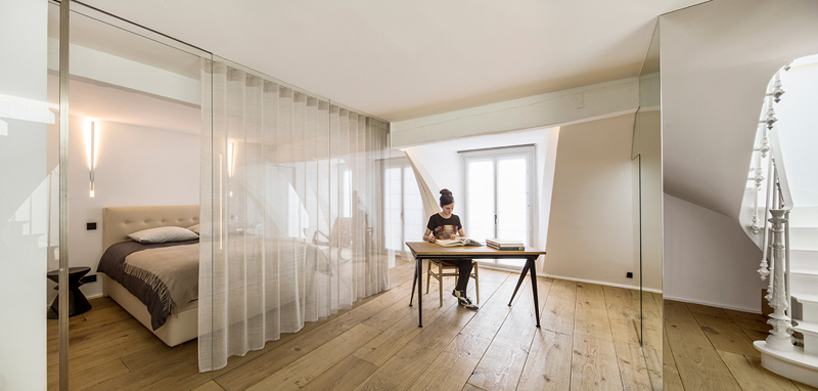 vincent parreira converts 19th century photography studio into parisian apartments