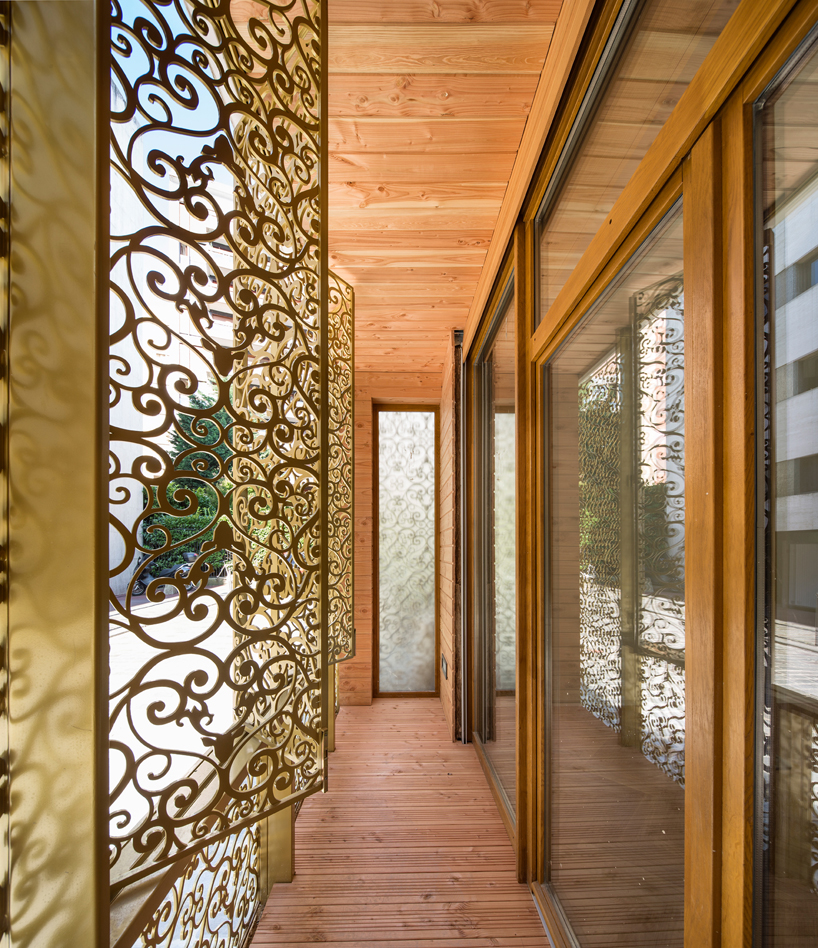 AAVP covers parisian building in golden sheets, carved like iron-worked balconies