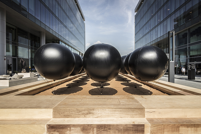 black balloons depict delicateness of middle eastern cities at dubai ...