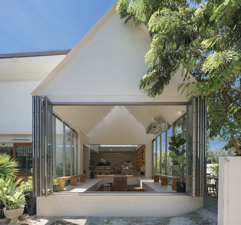 coffee beans cover sunken seating area in single origin chiangmai roastery by flat12x