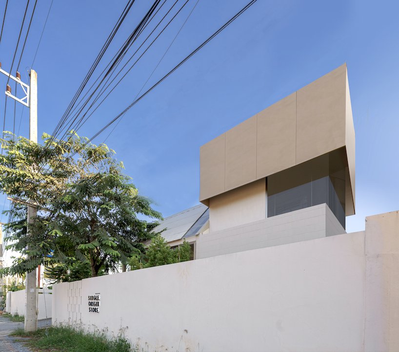 coffee beans cover sunken seating area in single origin chiangmai roastery by flat12x