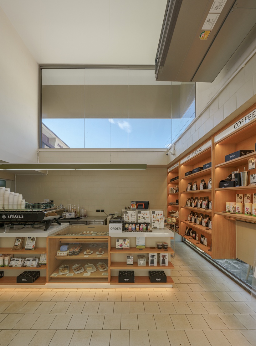 coffee beans cover sunken seating area in single origin chiangmai roastery by flat12x