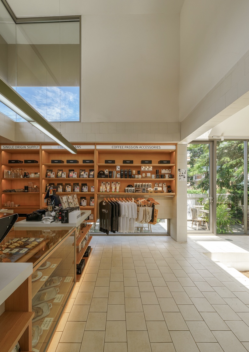 coffee beans cover sunken seating area in single origin chiangmai roastery by flat12x