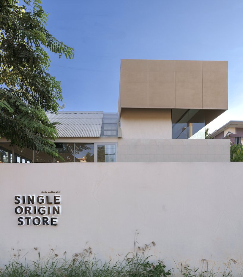 coffee beans cover sunken seating area in single origin chiangmai roastery by flat12x