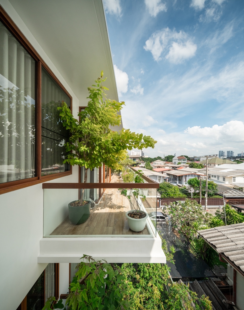 flat12x stacks floating gardens for senior-living house in bangkok