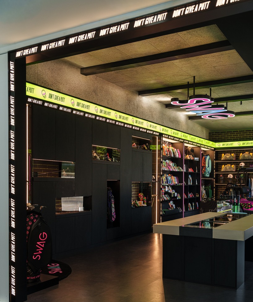 monochrome surfaces and neon accents outline swag golf bangkok flagship - 10
