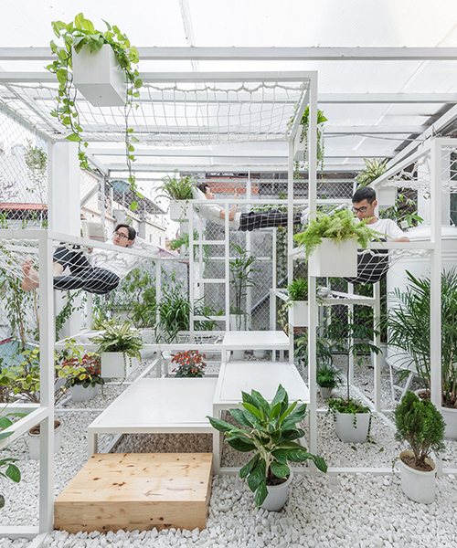 hung nguyen's eco-friendly pavilion in hanoi is adorned with air purifying plants