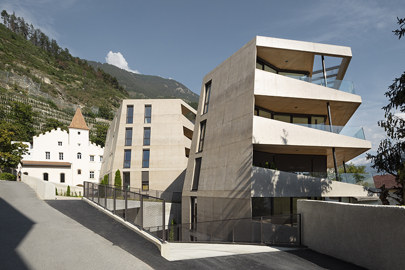 marx ladurner forms two concrete masses for residential complex in italy