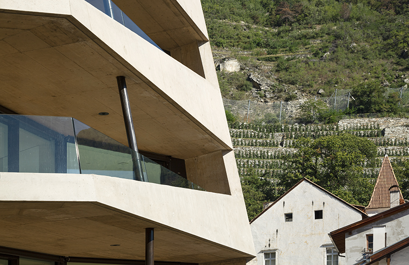 marx ladurner forms two concrete masses for residential complex in italy