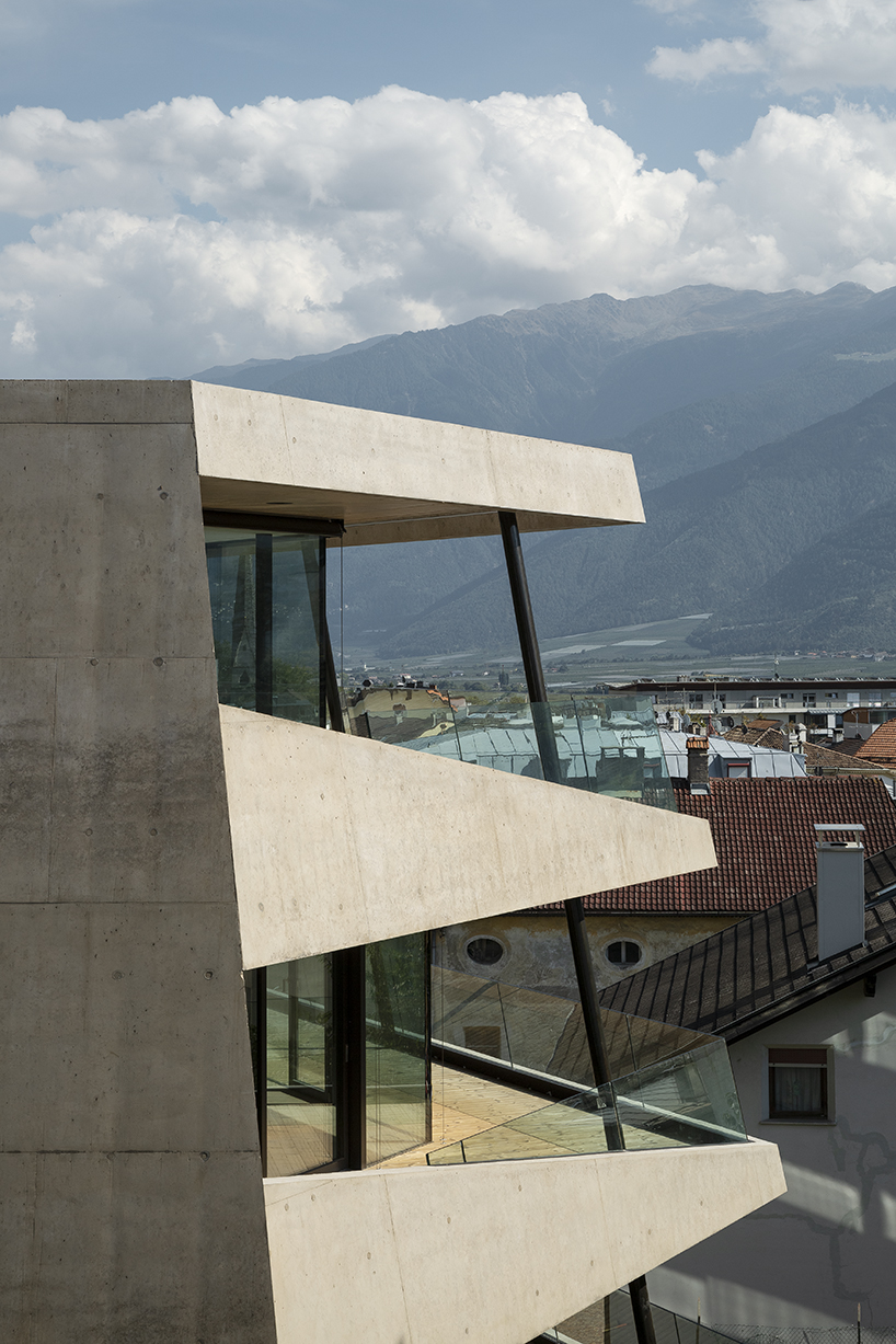 marx ladurner forms two concrete masses for residential complex in italy
