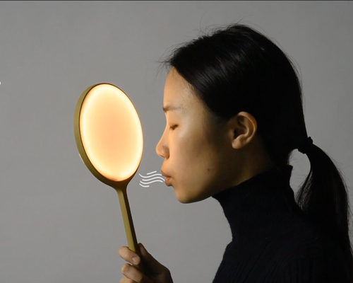 xinyue yang's sensor-enabled lamp lights like fire