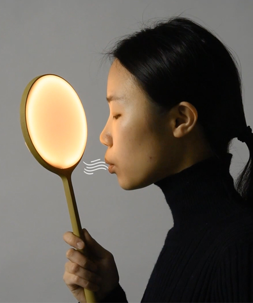 xinyue yang's sensor-enabled lamp lights like fire