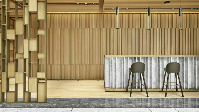 ji pan adorns pinggu office space with ethereal patterns of light + materials in beijing