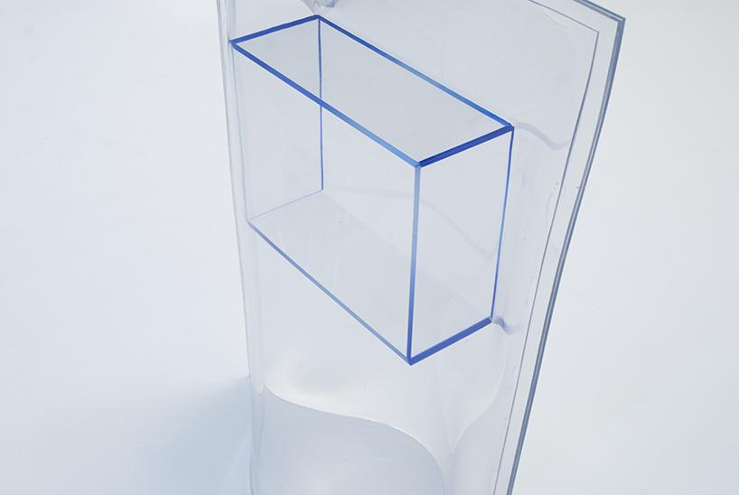 acrylic boxes and vinyl bags are combined into unusual freestanding structures