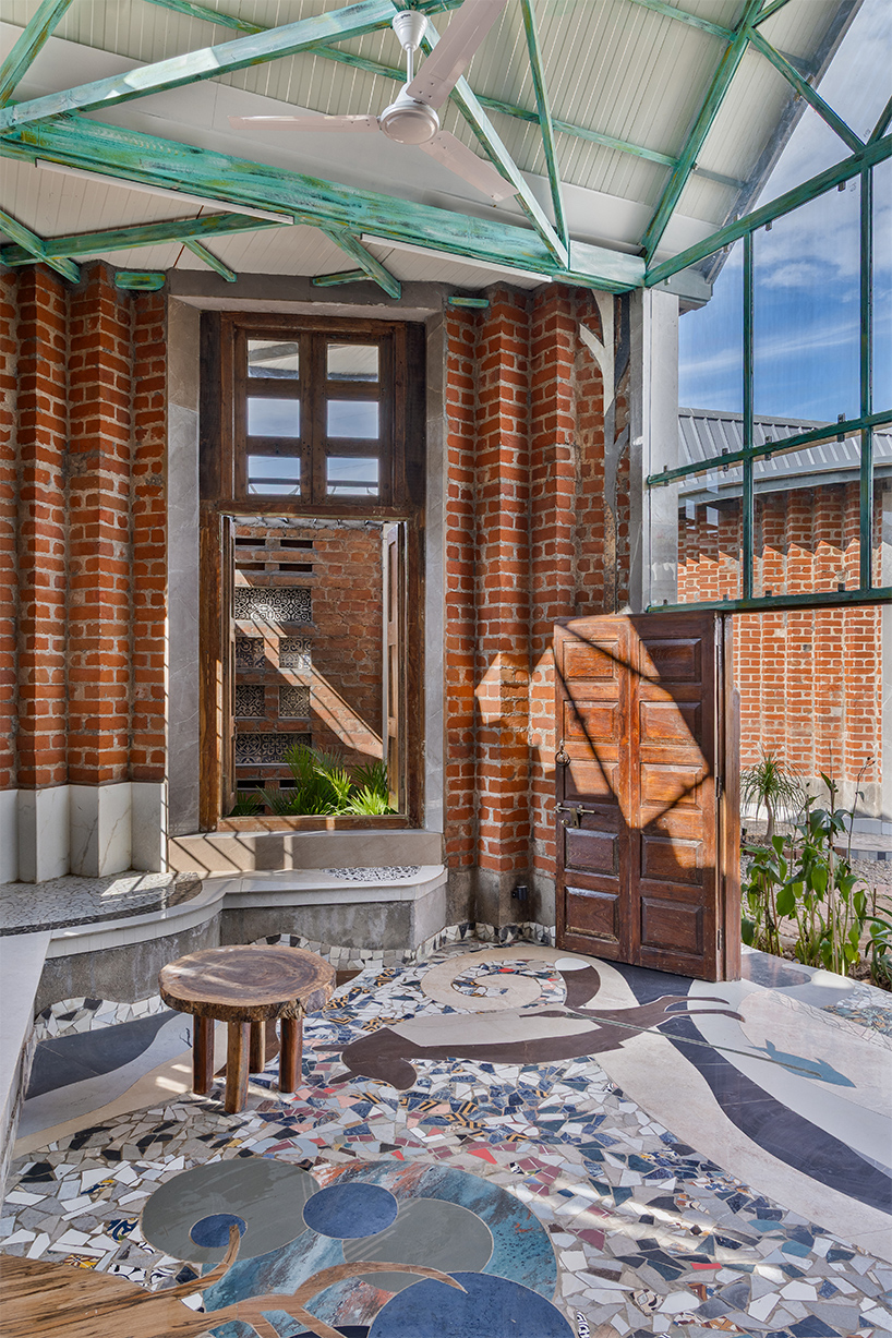 curved brick patterned walls frame farmhouse by manoj patel in india