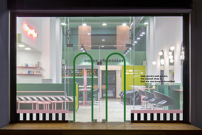 studiomateriality applies bold color palette within hair salon interior in athens, greece