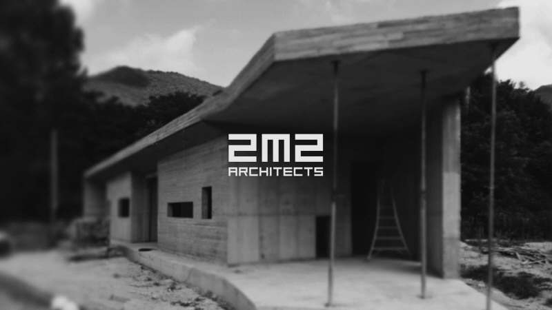 the apple farm house designed by 2m2 architects is inspired by its surrounding natural scenery