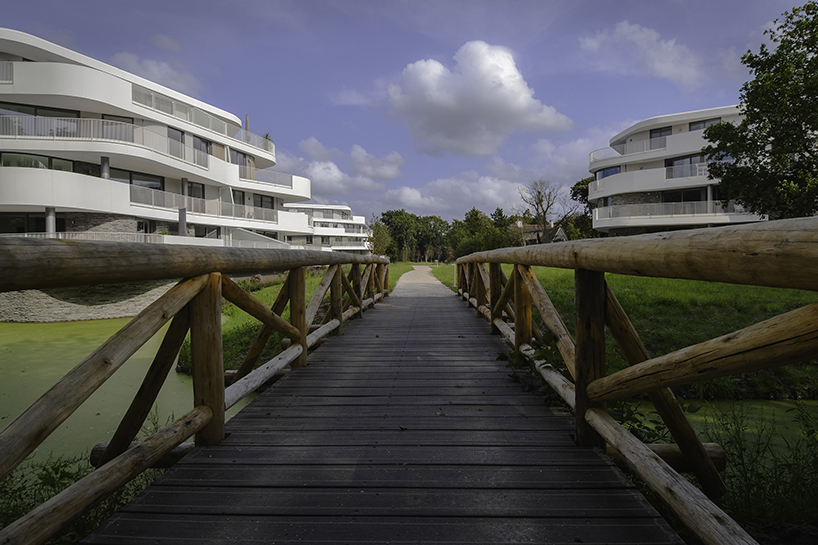 BREIN architects' organic-shaped villas are set in a park-like site in the netherlands