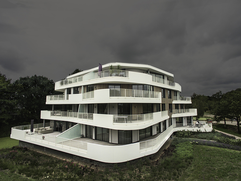 BREIN architects' organic-shaped villas are set in a park-like site in the netherlands