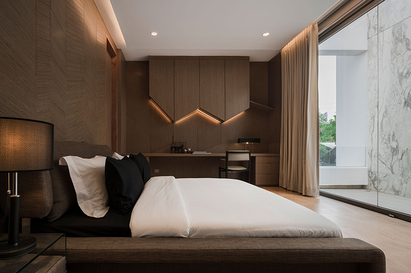 openbox intertwines architecture and landscape with marble house in thailand