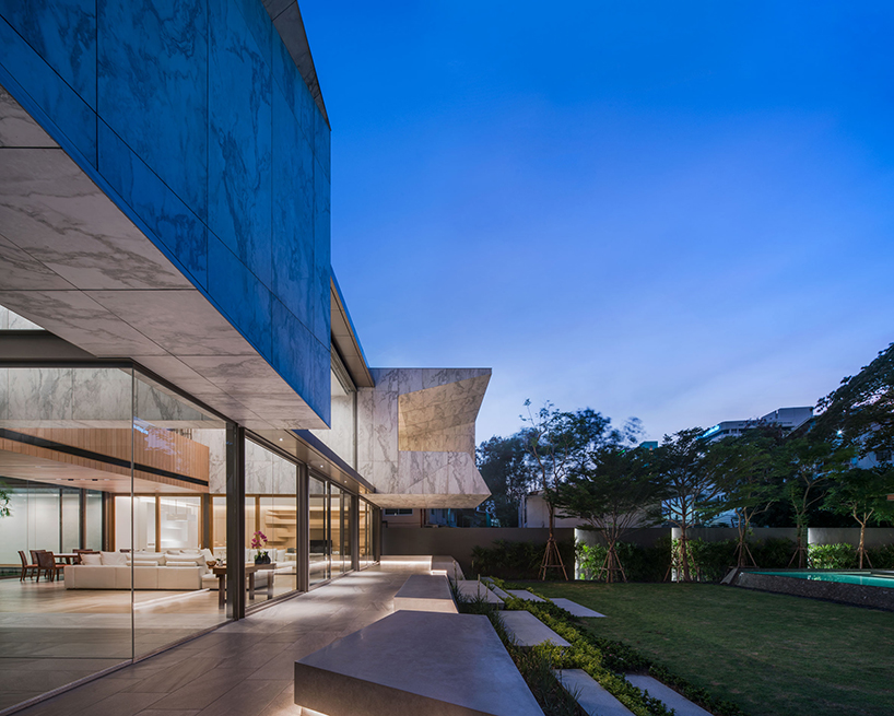 openbox intertwines architecture and landscape with marble house in thailand