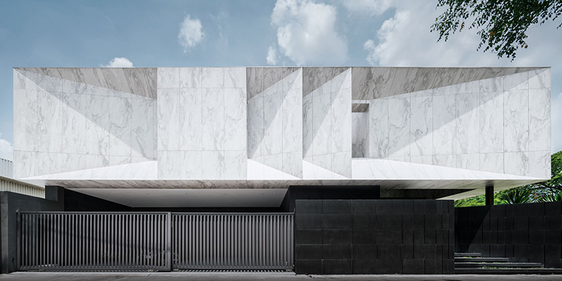 openbox intertwines architecture and landscape with marble house in thailand