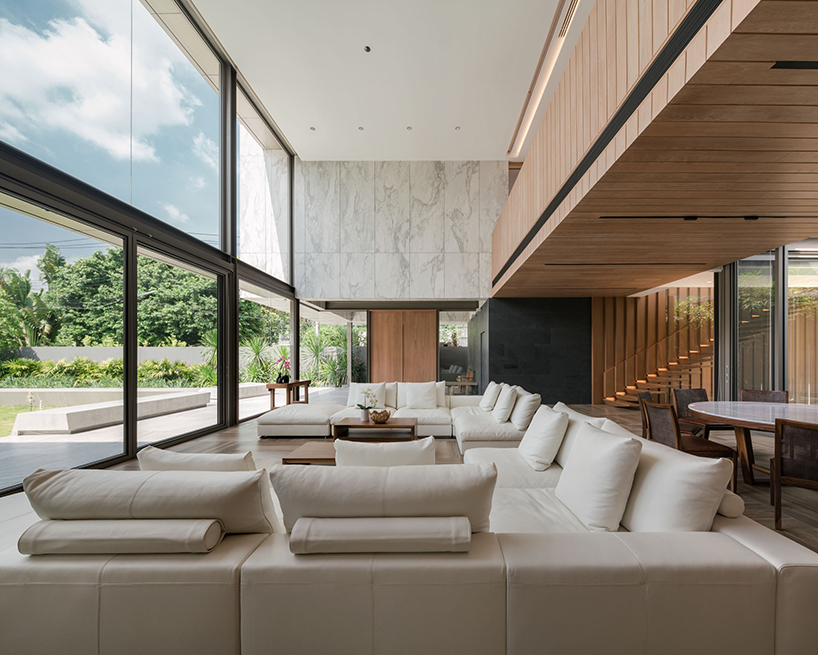 openbox intertwines architecture and landscape with marble house in thailand