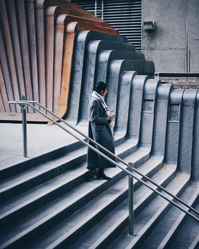 fjmt studio's kinetic tower of wood transcends grey skyscrapers in sydney