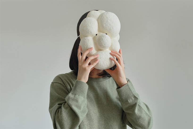 kuo duo creates mushroom mycelium masks to promote biomaterials designboom