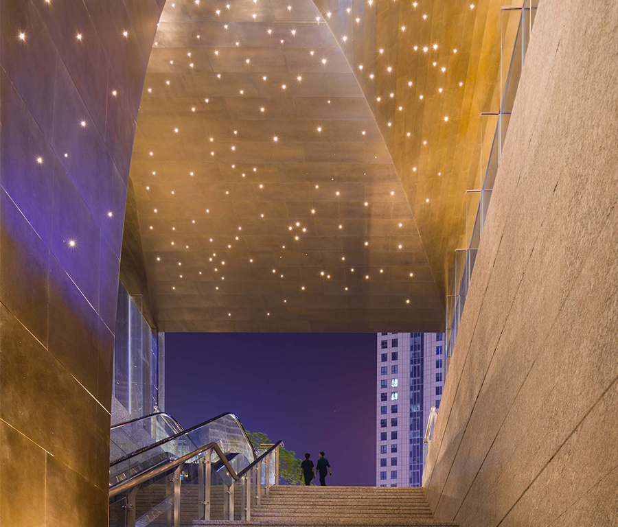 UAP's emergence installation unveils a captivating brass entry canopy
