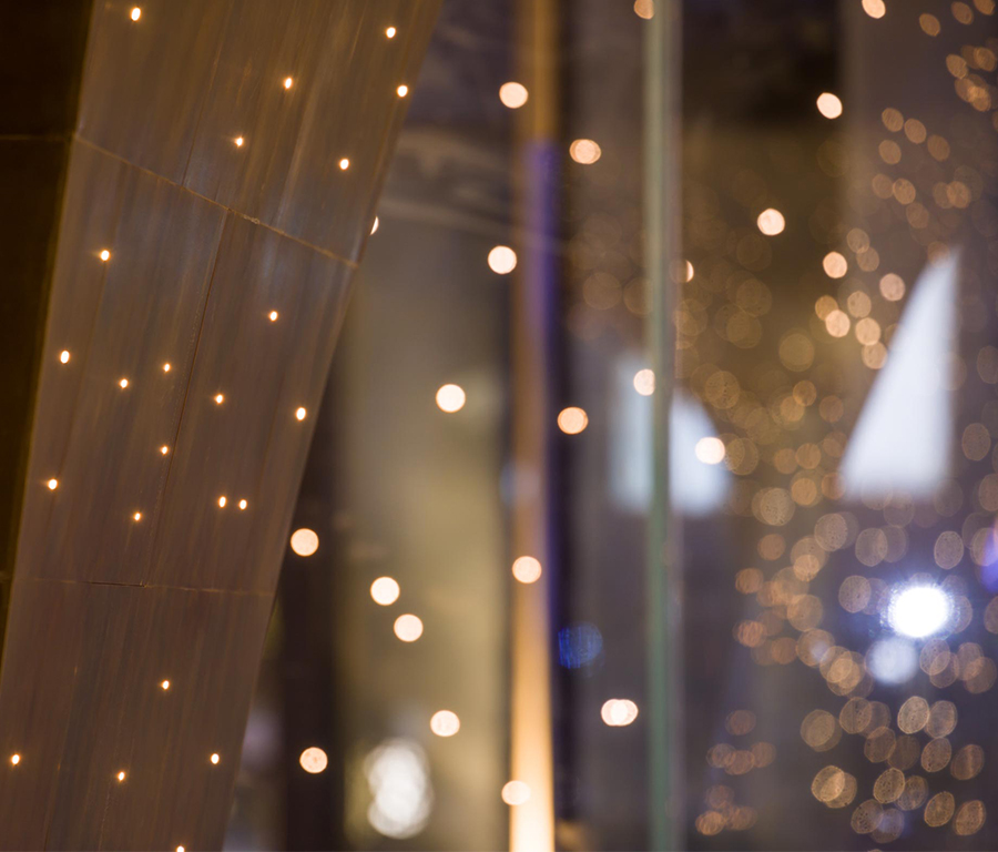 UAP's emergence installation unveils a captivating brass entry canopy