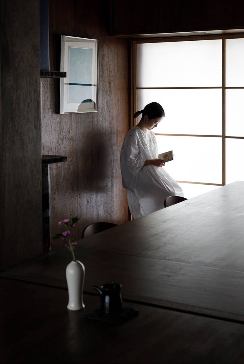 1110 designs a house and office in osaka with wood panels and warm grey