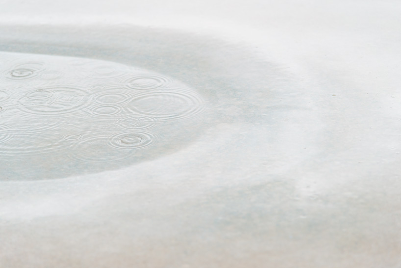 jean couvreur sculpts white concrete bench as an urban oasis