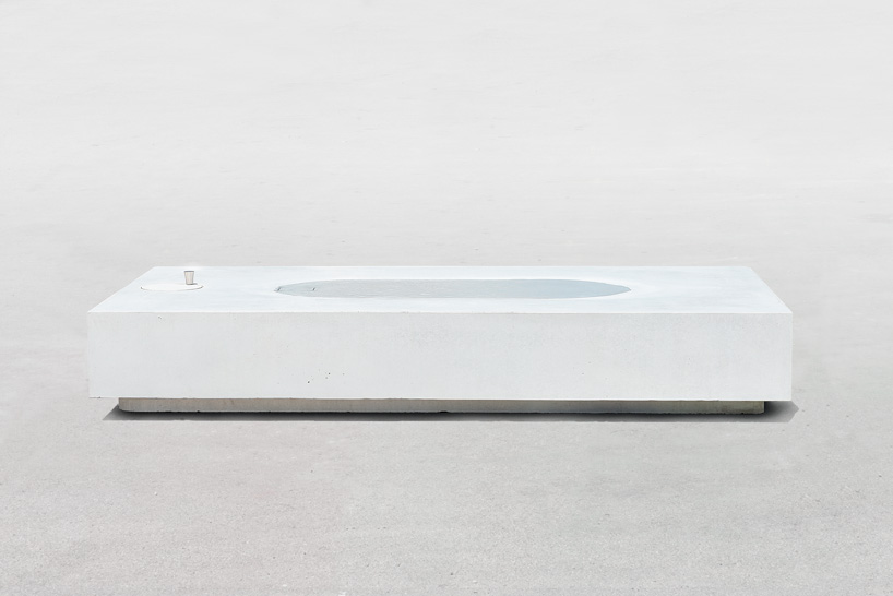 jean couvreur sculpts white concrete bench as an urban oasis