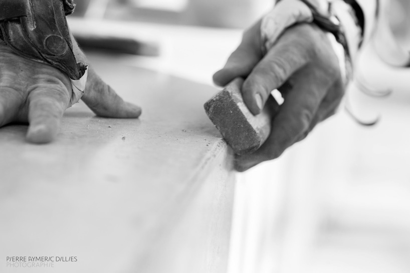 jean couvreur sculpts white concrete bench as an urban oasis