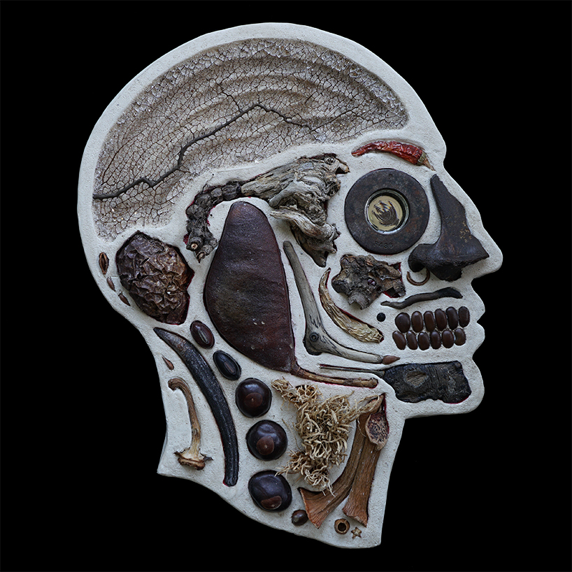EMnXW's surrealist head sculptures are made of miscellaneous objects