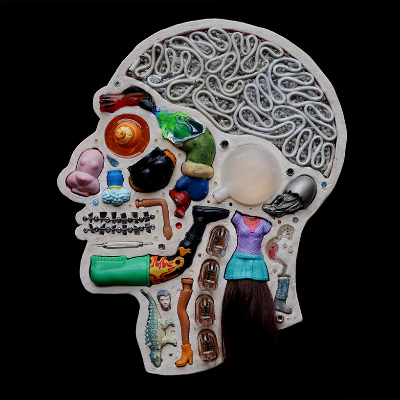 EMnXW's surrealist head sculptures are made of miscellaneous objects