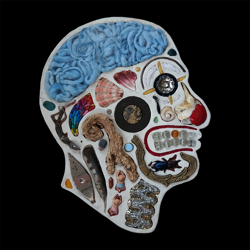 EMnXW's surrealist head sculptures are made of miscellaneous objects
