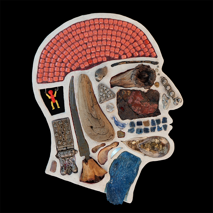 EMnXW's surrealist head sculptures are made of miscellaneous objects