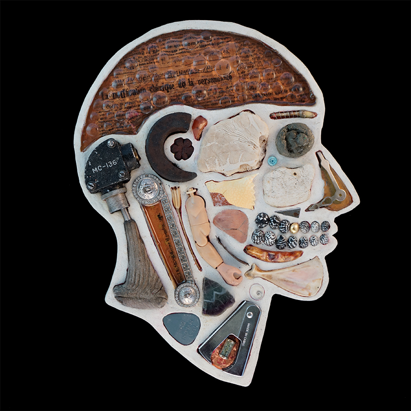 EMnXW's surrealist head sculptures are made of miscellaneous objects