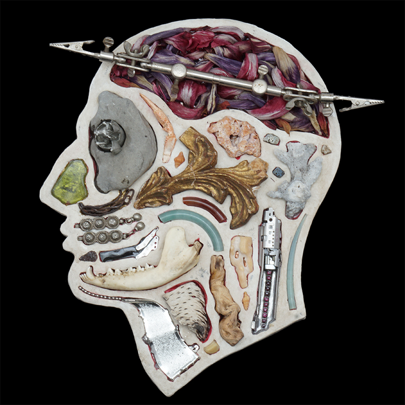 EMnXW's surrealist head sculptures are made of miscellaneous objects