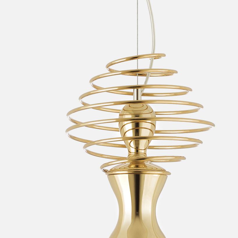 sergi ventura's latest pendant light collection features violins, flowers and birds all plated in 24k gold