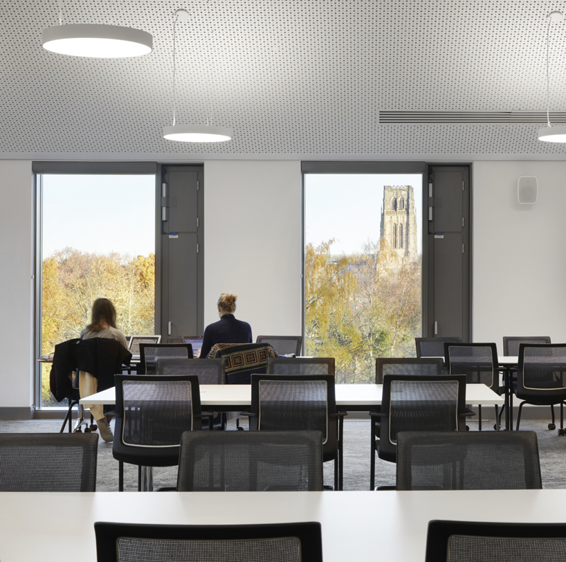 asymetric pyramids cap faulknerbrown’s new building in durham university in england