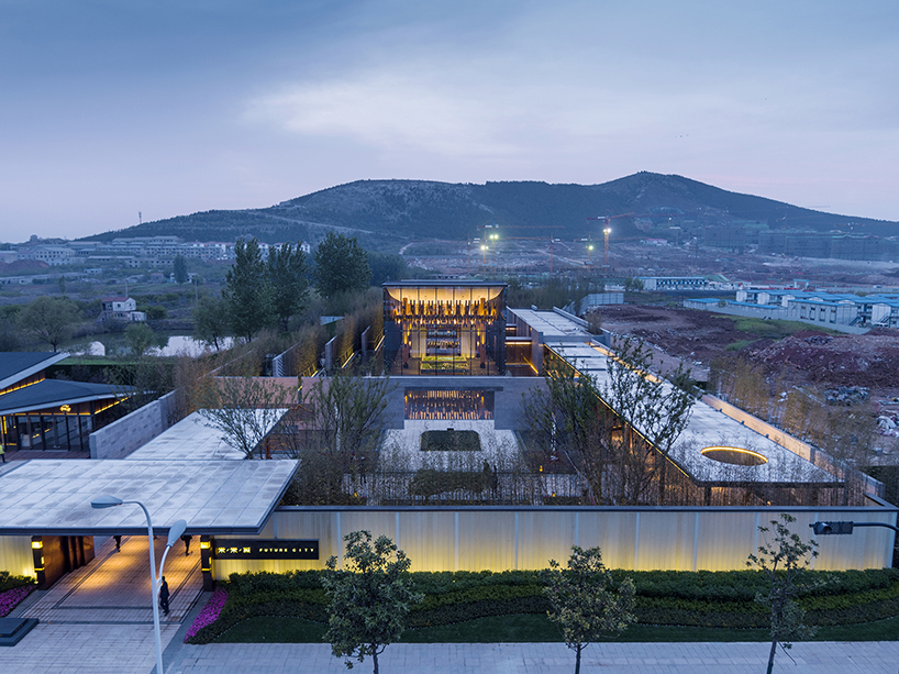 traditional chinese craftsmanship inspires exhibition space by continuation studio