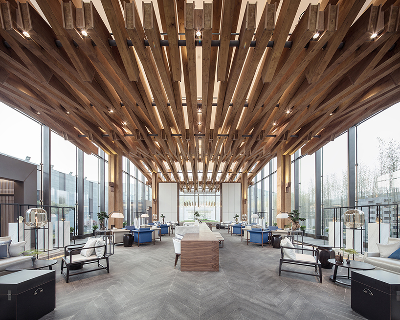 traditional chinese craftsmanship inspires exhibition space by continuation studio