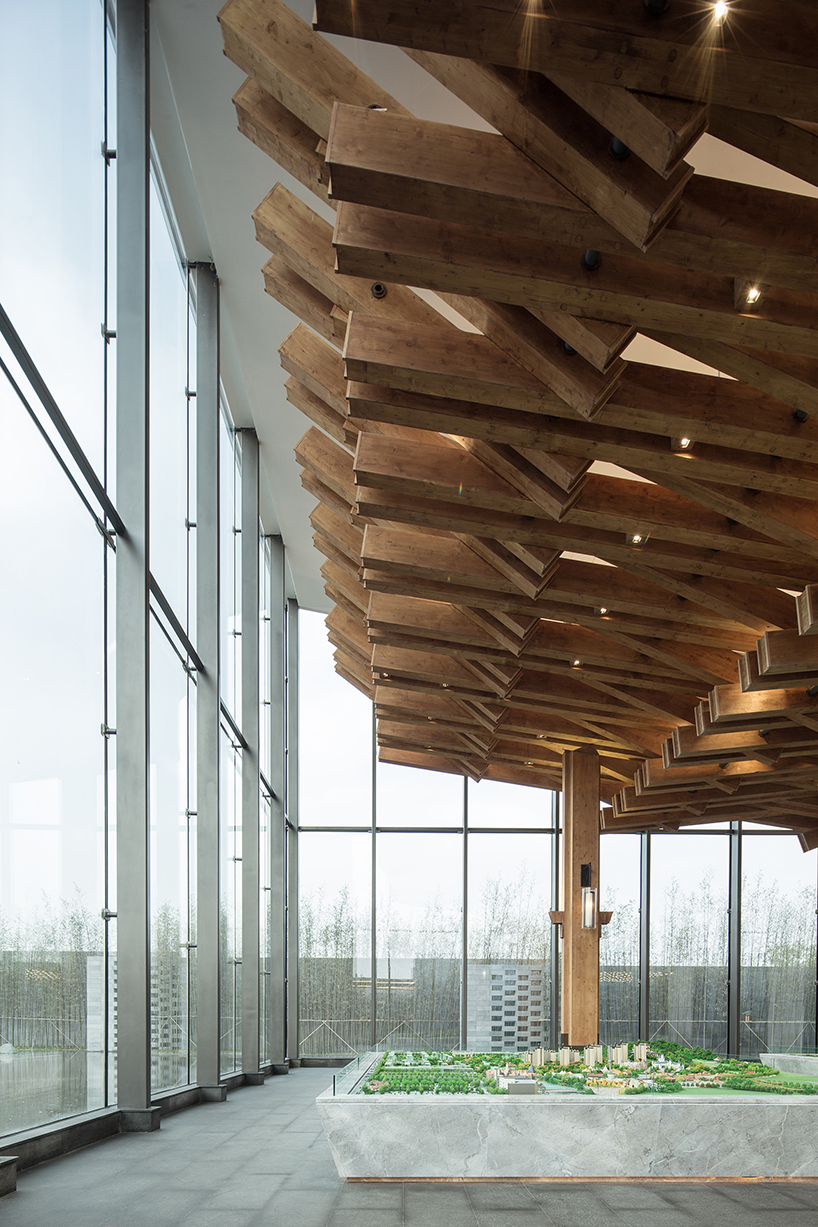 traditional chinese craftsmanship inspires exhibition space by continuation studio